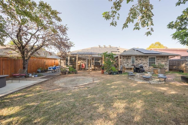 view of yard with a fire pit, a patio, and a gazebo