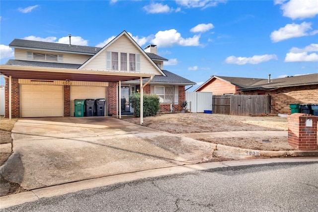 view of front of home featuring a garage and a carport