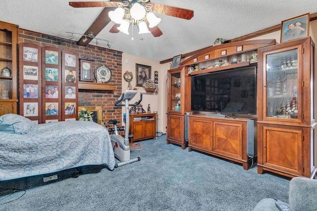 bedroom with carpet and a textured ceiling