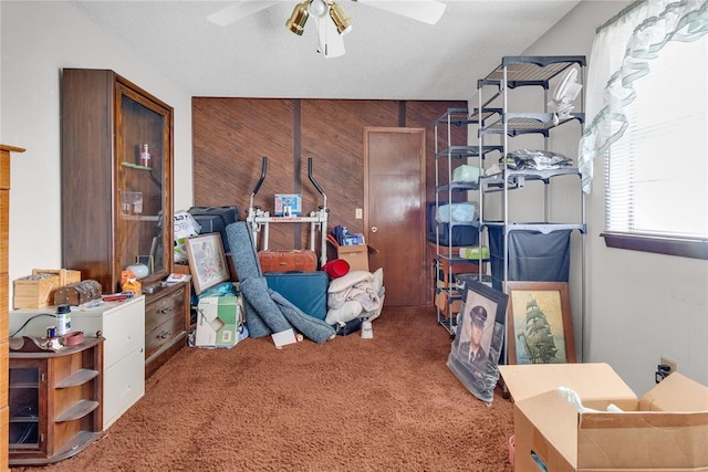 interior space featuring ceiling fan