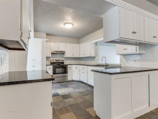 kitchen with white cabinetry, sink, dark stone countertops, electric range, and kitchen peninsula