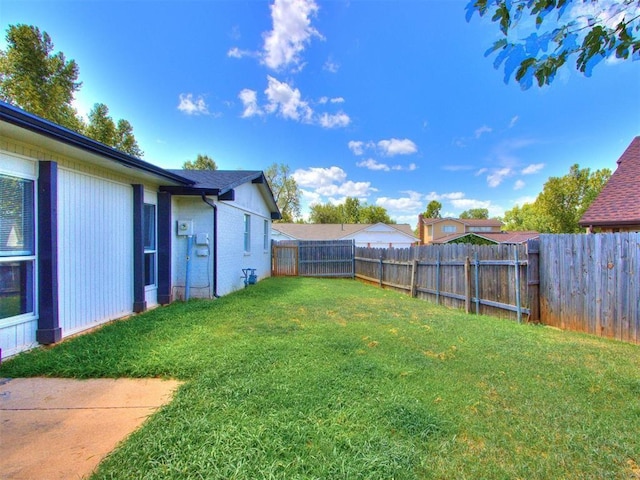 view of yard featuring a fenced backyard