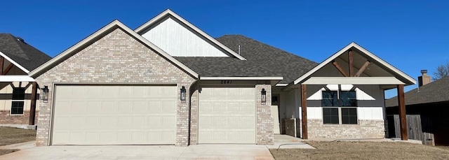 view of front of property with a garage