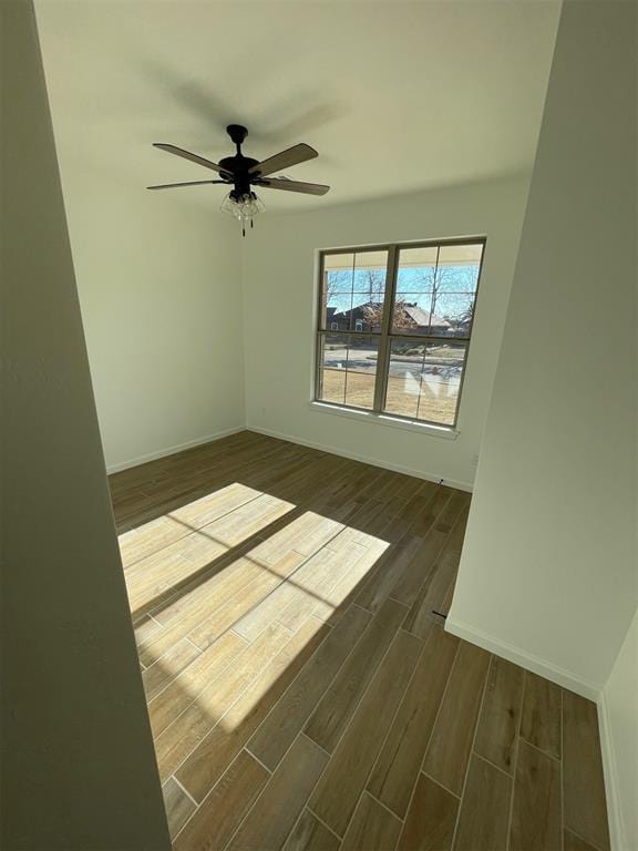 unfurnished room featuring ceiling fan