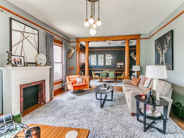 living room featuring hardwood / wood-style floors and a fireplace