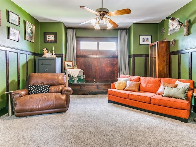 living room with carpet and ceiling fan