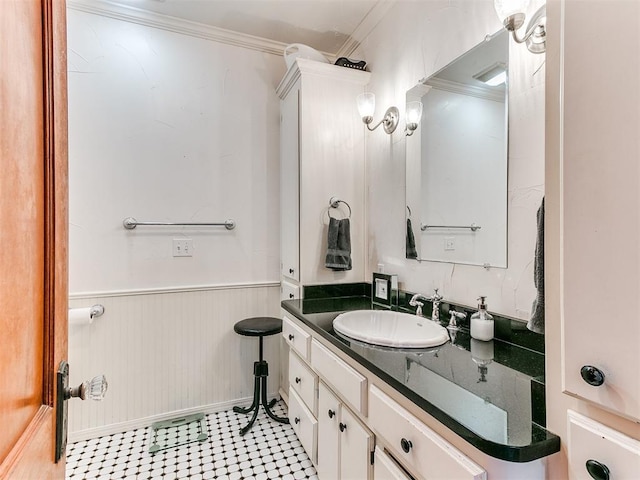 bathroom with vanity and ornamental molding