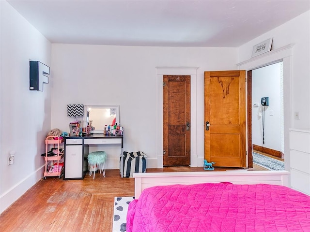 bedroom featuring hardwood / wood-style floors