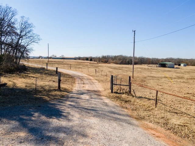 view of road with a rural view