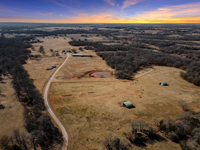 view of aerial view at dusk