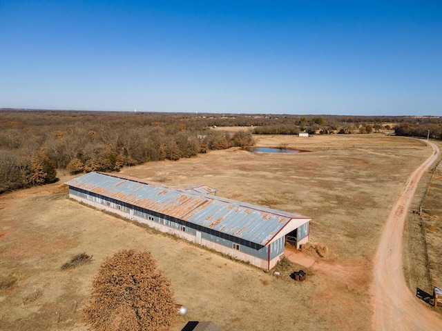 birds eye view of property featuring a rural view