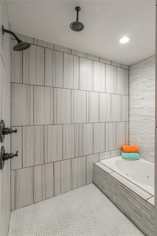 full bath with tiled shower, a jetted tub, tile walls, and tile patterned floors