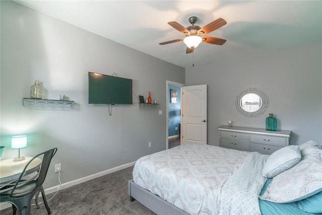 carpeted bedroom featuring baseboards and a ceiling fan