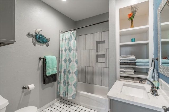 bathroom featuring vanity, toilet, and shower / bathtub combination with curtain