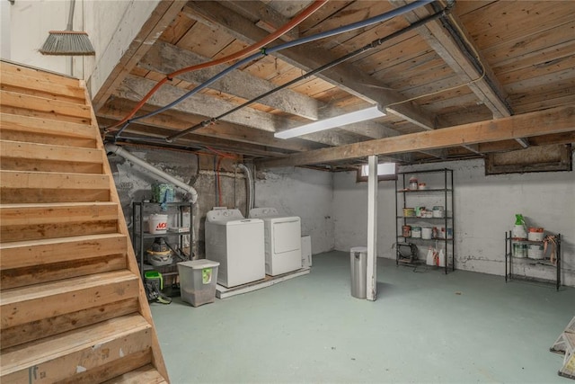 unfinished basement with separate washer and dryer