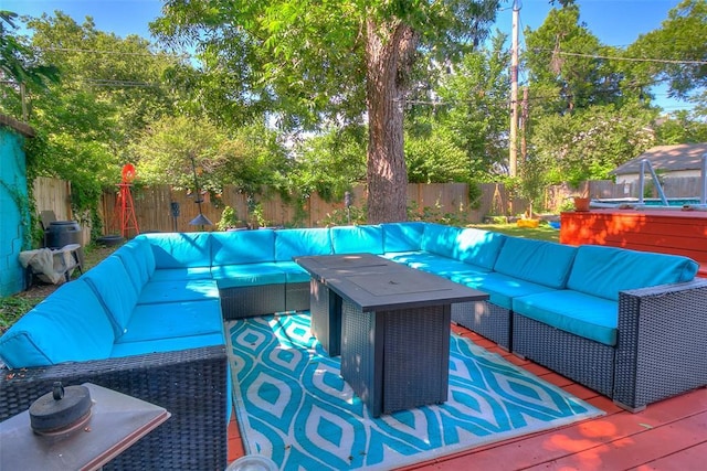 view of patio / terrace with an outdoor hangout area and a fenced backyard