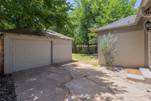 detached garage with fence