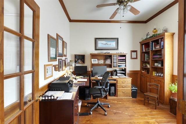 office area featuring ornamental molding, ceiling fan, and light wood-type flooring