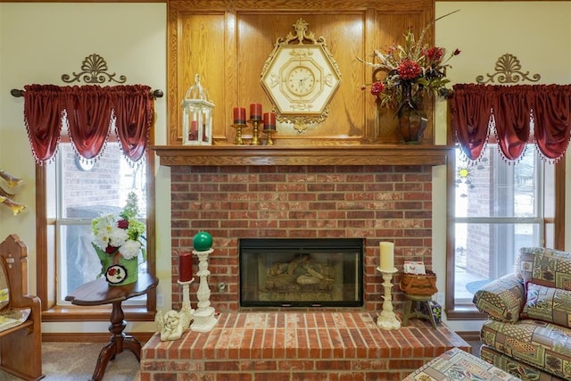 details featuring a brick fireplace and carpet flooring