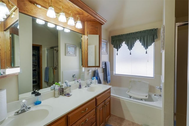 bathroom with vanity, tile patterned flooring, and independent shower and bath