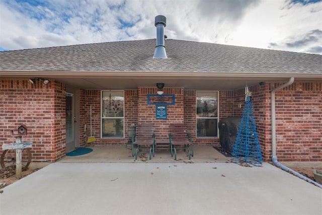 rear view of property with a patio