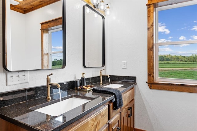 bathroom featuring vanity and wooden ceiling