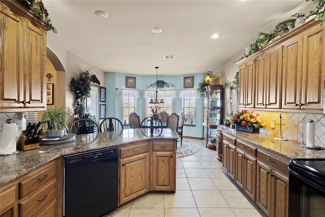 kitchen with arched walkways, decorative backsplash, a peninsula, black appliances, and light tile patterned flooring