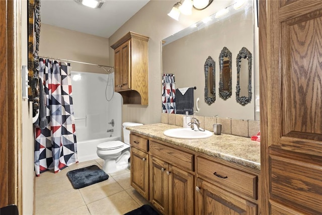 bathroom featuring shower / tub combo, tile patterned flooring, vanity, and toilet