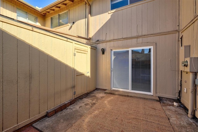 doorway to property featuring a patio