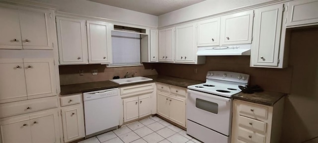 kitchen with white cabinetry, sink, white appliances, and light tile patterned floors