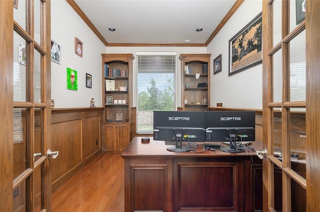 office with crown molding and light wood-type flooring