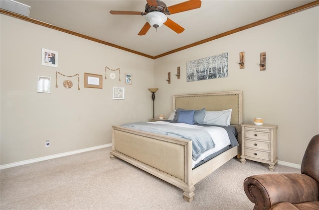 carpeted bedroom featuring crown molding and ceiling fan