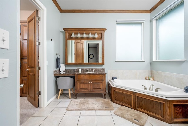 bathroom with tile patterned floors, ornamental molding, a bath, and vanity