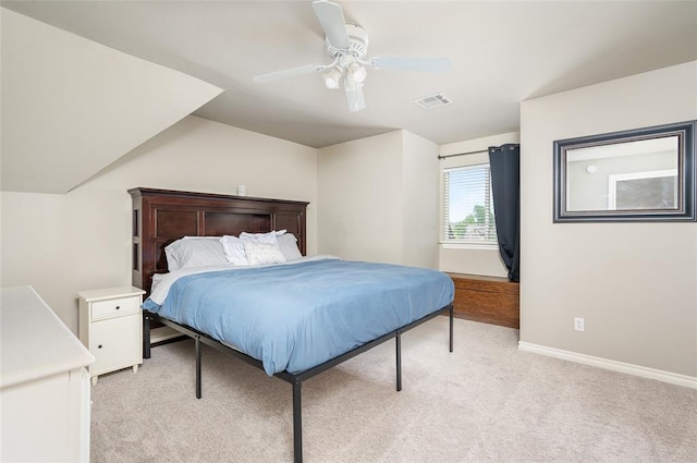 bedroom featuring light colored carpet and ceiling fan