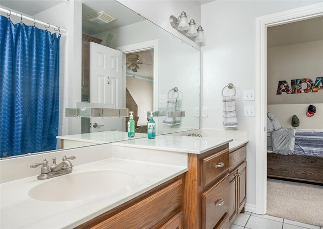 bathroom with vanity and tile patterned floors