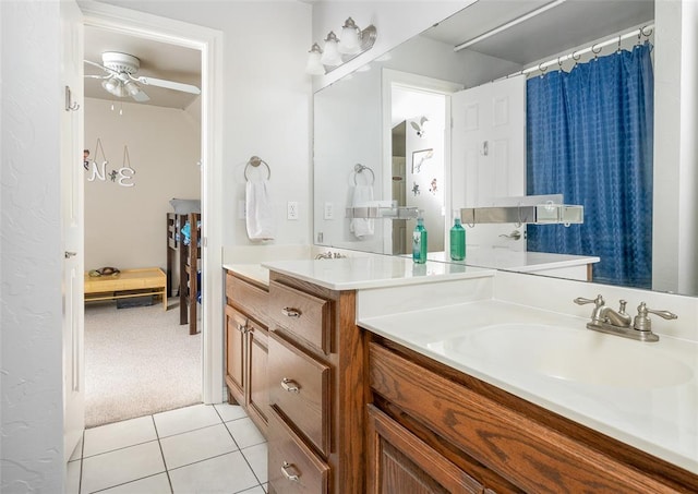 bathroom with vanity, tile patterned flooring, and ceiling fan