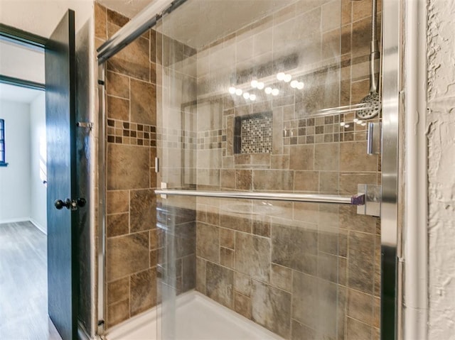 bathroom with a stall shower