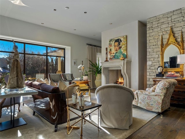 sitting room with wood-type flooring