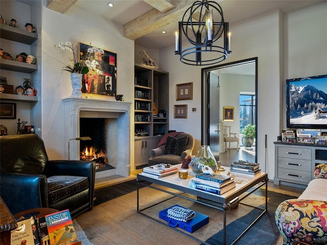 living room with beamed ceiling, dark hardwood / wood-style floors, and built in features