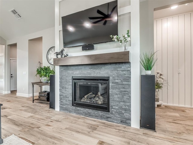 room details featuring hardwood / wood-style floors and a fireplace