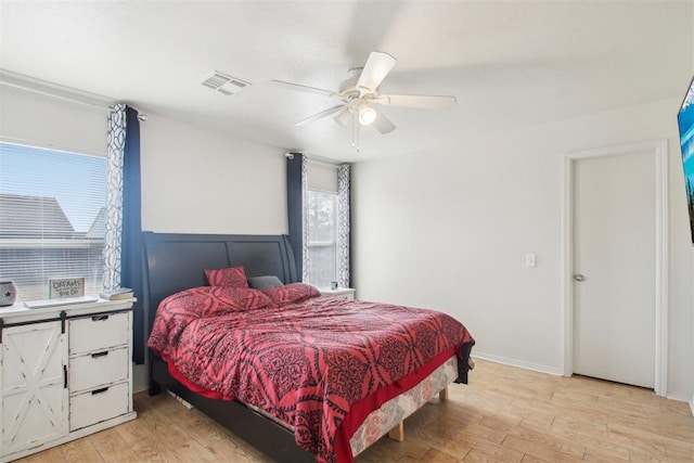 bedroom featuring ceiling fan and light hardwood / wood-style floors