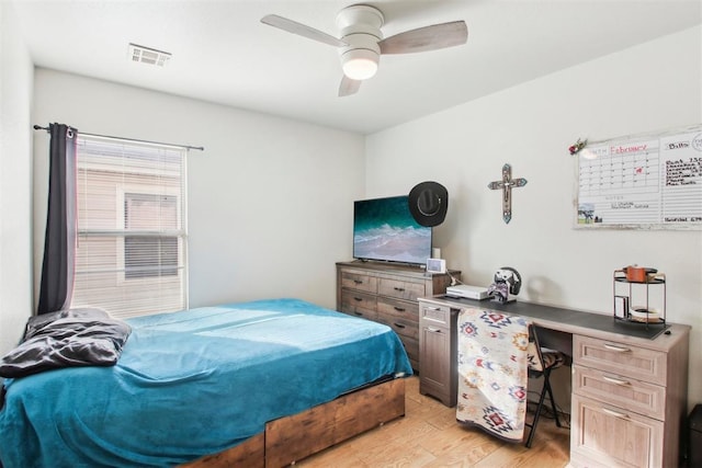 bedroom featuring ceiling fan and light hardwood / wood-style floors