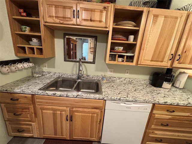 kitchen featuring dishwasher, a sink, and open shelves