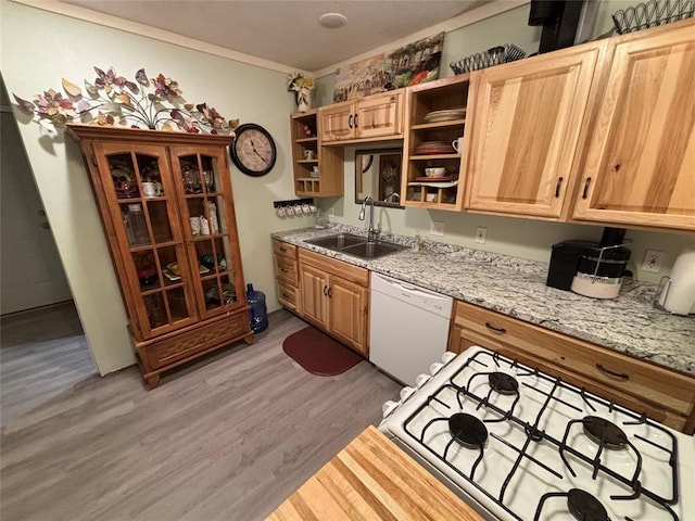 kitchen featuring white appliances, ornamental molding, light wood-type flooring, open shelves, and a sink