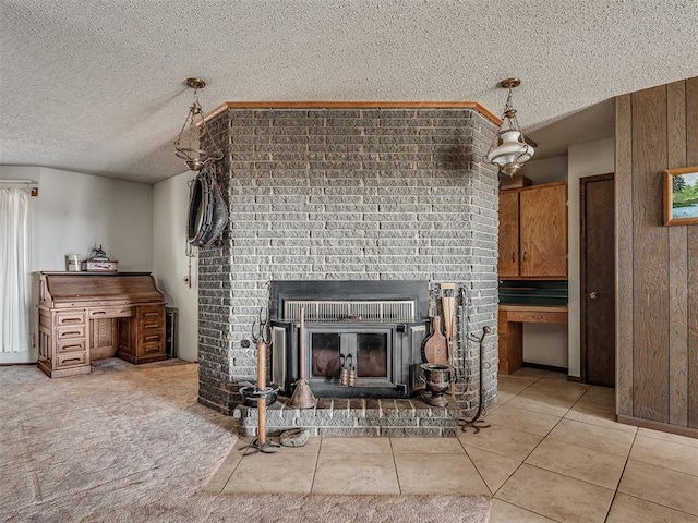 room details featuring a textured ceiling and a fireplace