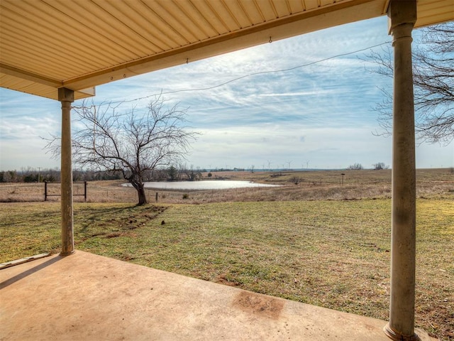 view of yard with a patio area and a rural view