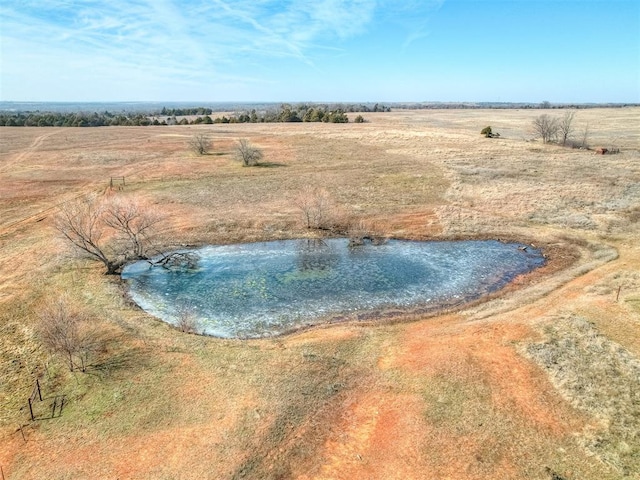 aerial view featuring a water view and a rural view