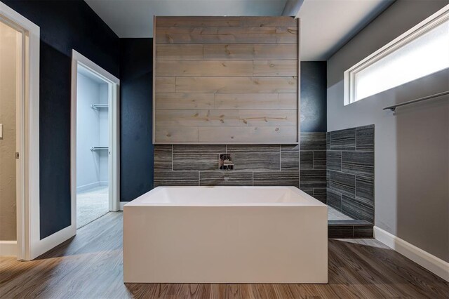 1548 NW 175th Ct, Edmond, OK 73012 - full bath with a garden tub, wood finished floors, and baseboards