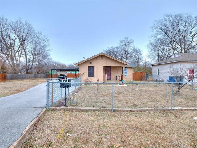 view of front of home with a carport