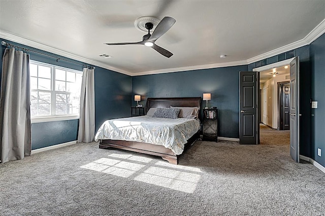 bedroom featuring visible vents, ceiling fan, baseboards, carpet, and ornamental molding